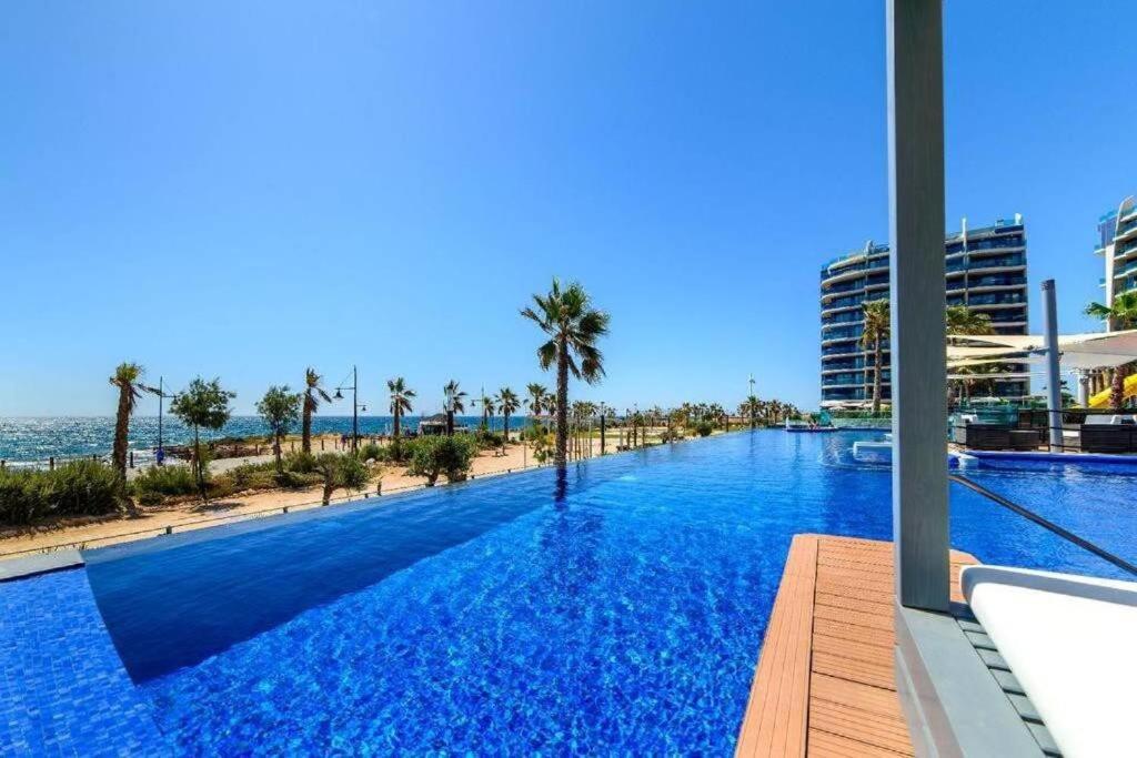Bazén v ubytování Sea Senses Punta Prima by Villas&You nebo v jeho okolí