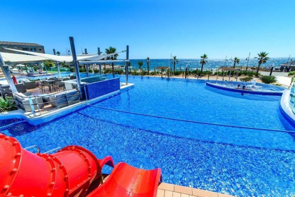 Bazén v ubytování Sea Senses Punta Prima by Villas&You nebo v jeho okolí