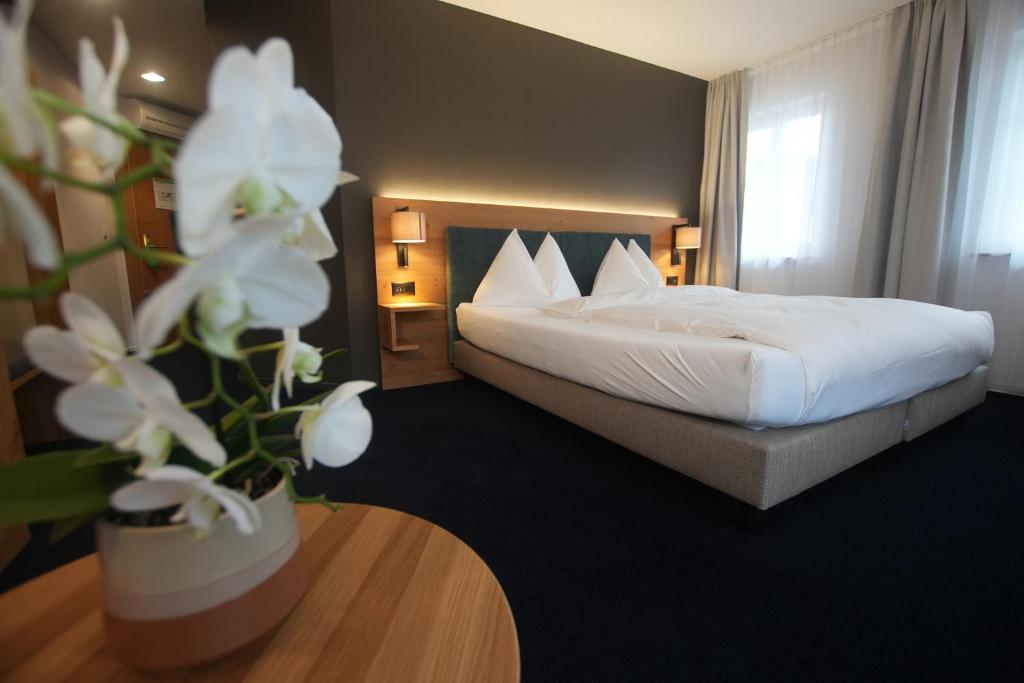 Postel nebo postele na pokoji v ubytování Hotel-Restaurant Löwen