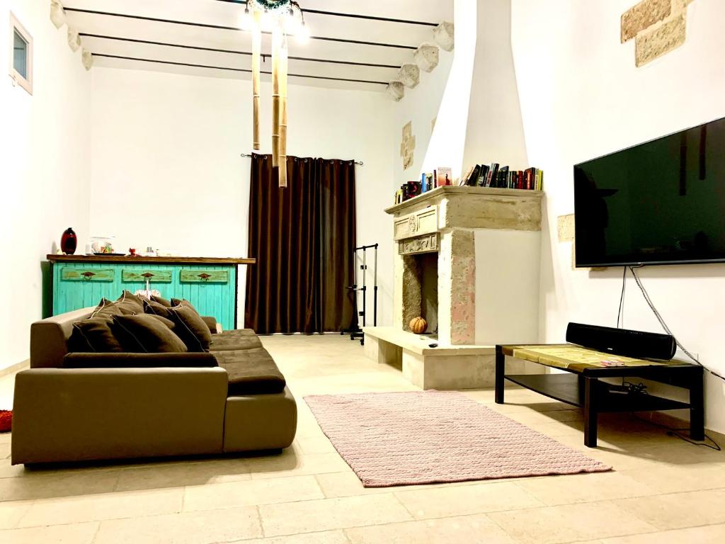 TV a/nebo společenská místnost v ubytování Lu Chiapparu - Vacanza Low Cost
