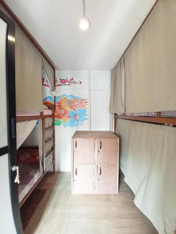 Postel nebo postele na pokoji v ubytování Hostel Swastik