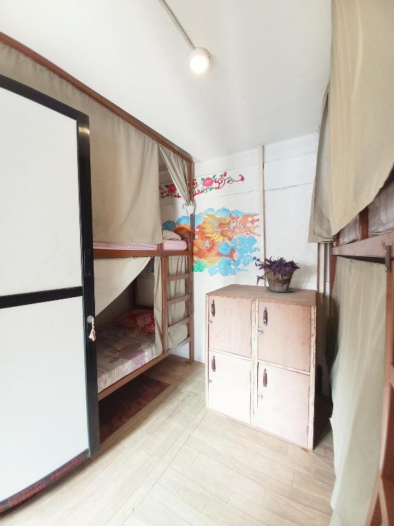 Postel nebo postele na pokoji v ubytování Hostel Swastik