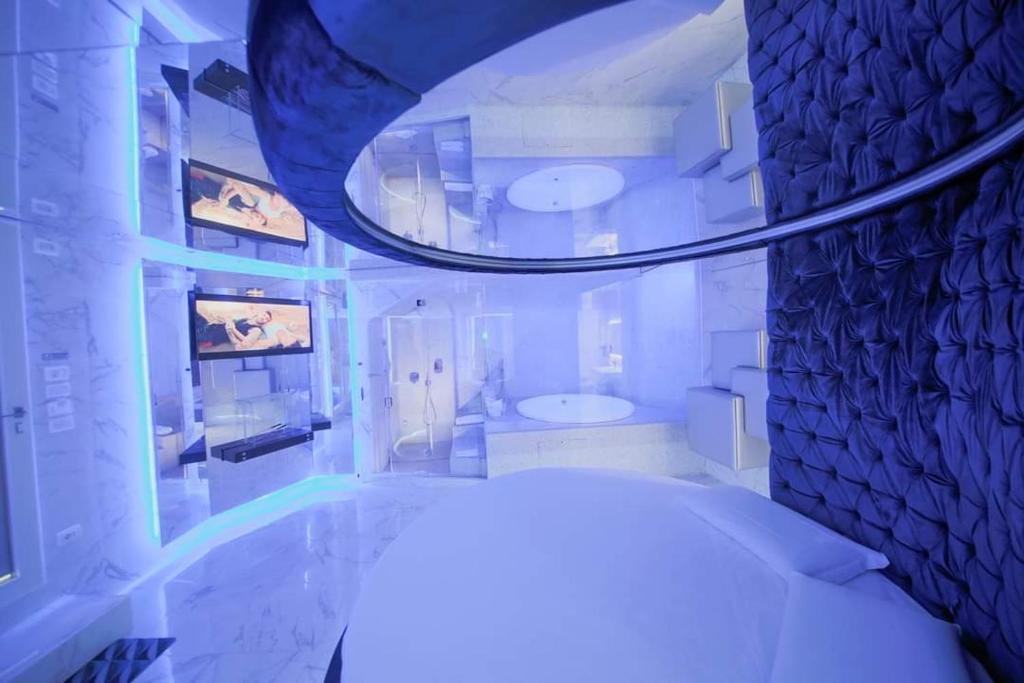 Postel nebo postele na pokoji v ubytování Cleros Sky Lounge