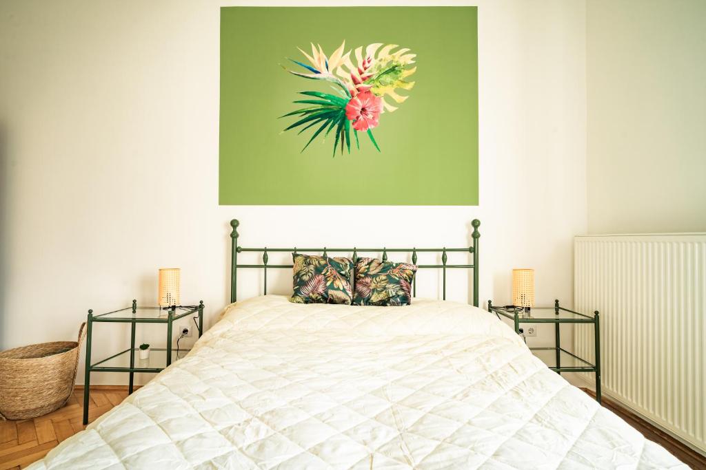 A bed or beds in a room at Colors Apartment