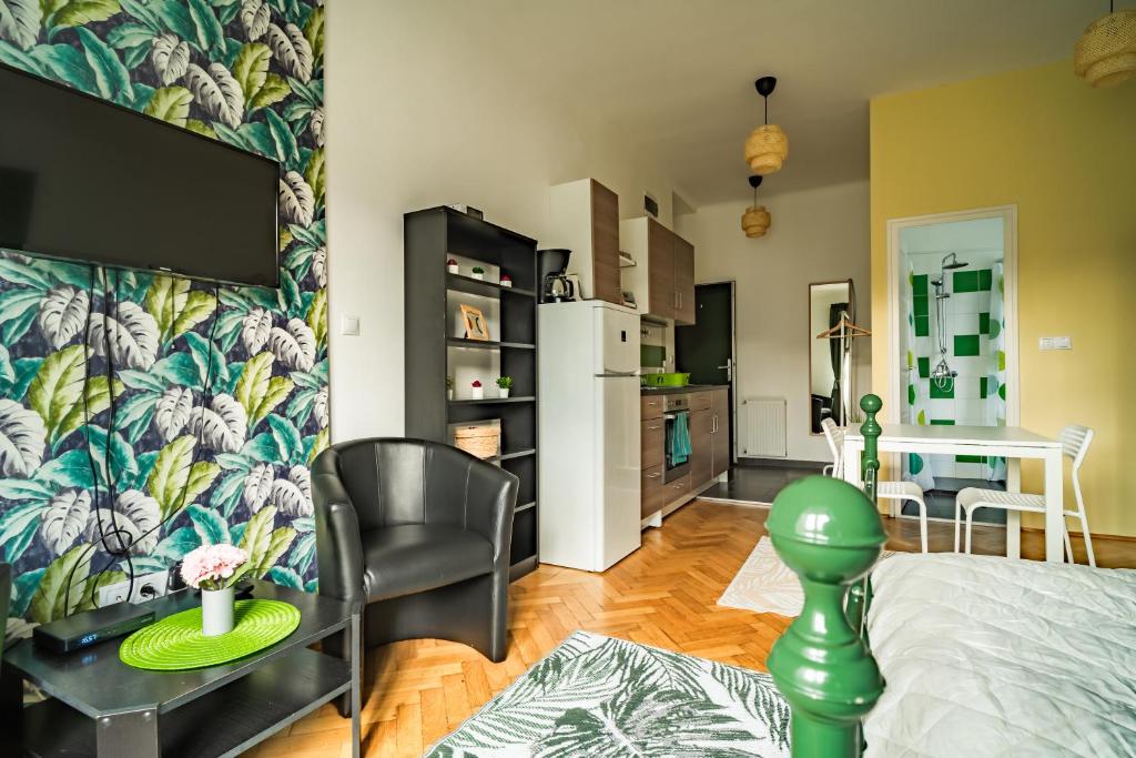 A kitchen or kitchenette at Colors Apartment