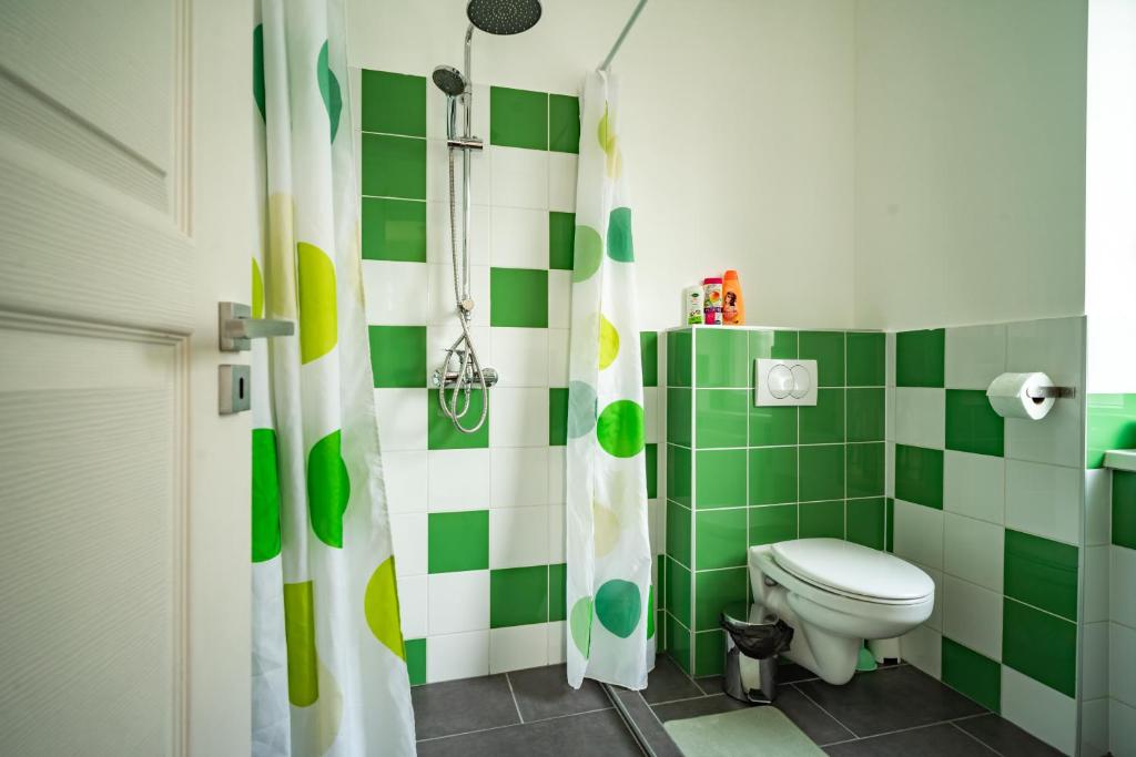 A bathroom at Colors Apartment