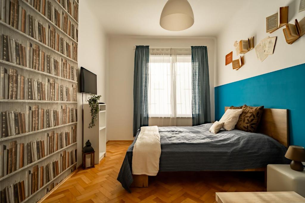 A bed or beds in a room at Colors Apartment