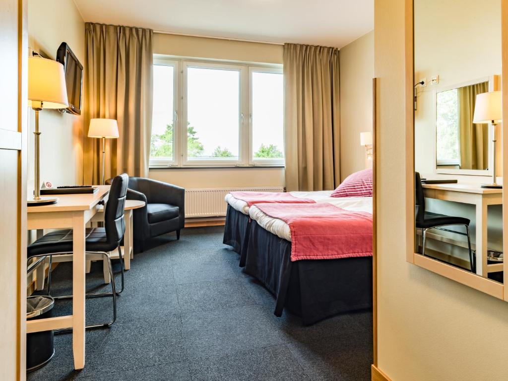 Postel nebo postele na pokoji v ubytování Ringsjöstrand Hotel