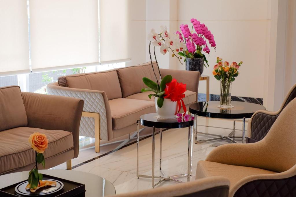 Posezení v ubytování The Grand Mansion Menteng by The Crest Collection