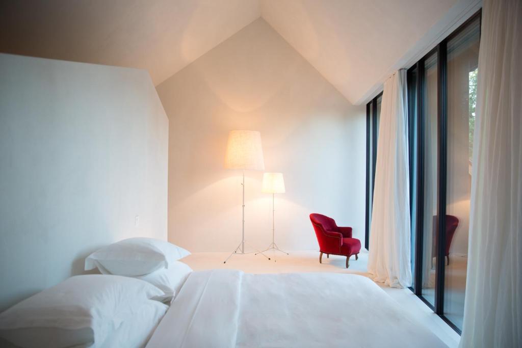 Postel nebo postele na pokoji v ubytování Hotel Krone Regensberg