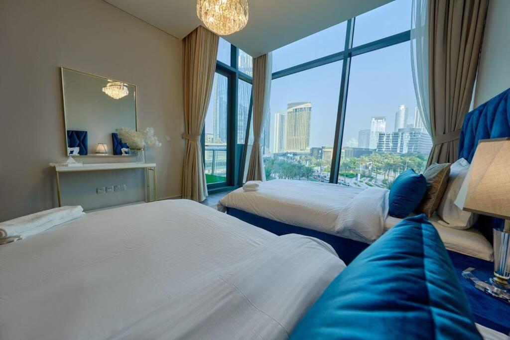 Postel nebo postele na pokoji v ubytování Magnificent Stunning 3 BR With Burj Khalifa View