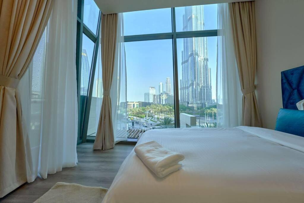 Postel nebo postele na pokoji v ubytování Magnificent Stunning 3 BR With Burj Khalifa View