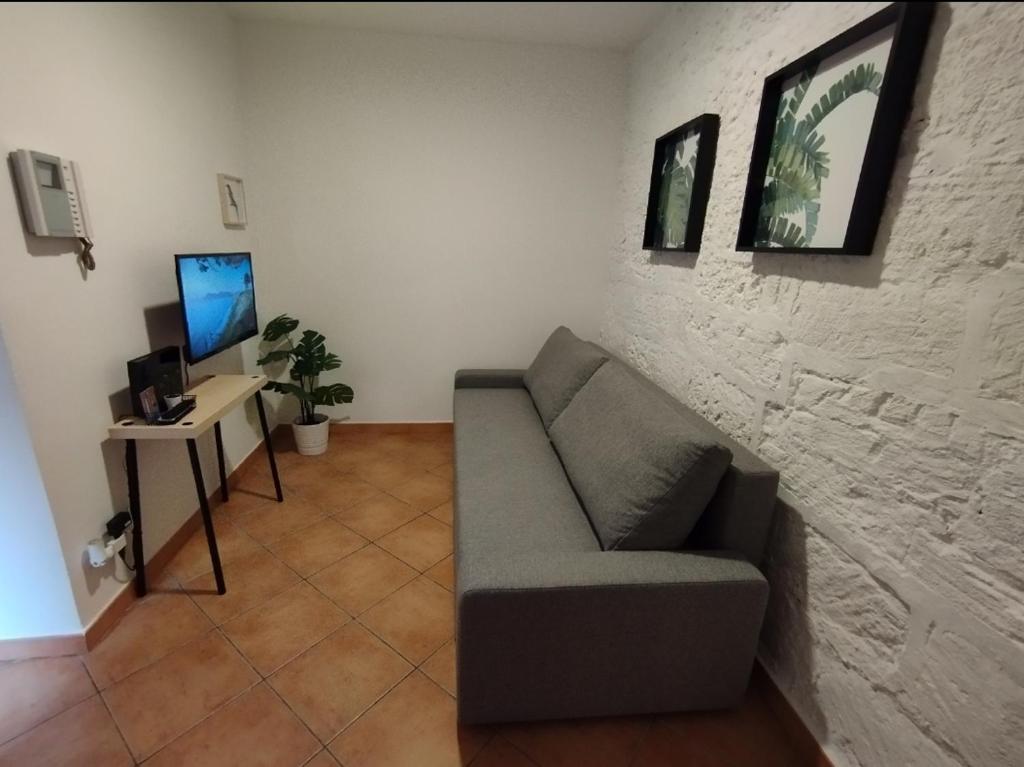 Televízia a/alebo spoločenská miestnosť v ubytovaní Divisi64