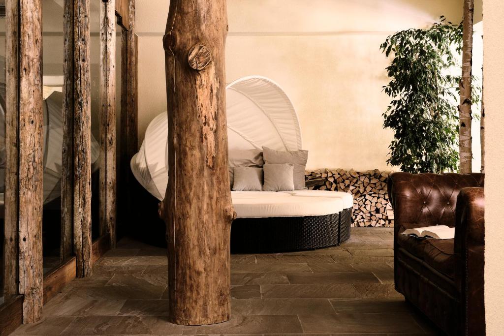 Postel nebo postele na pokoji v ubytování Boutique Hotel e Chalets Salvadori