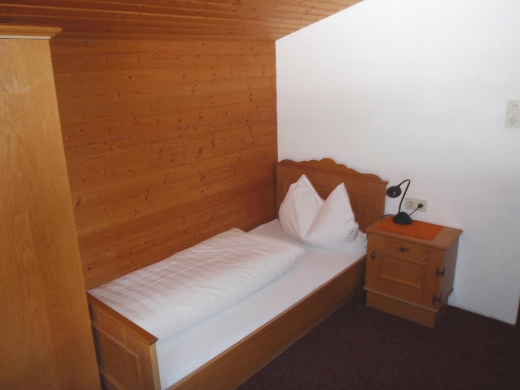 Postel nebo postele na pokoji v ubytování Alpengasthof Zollwirt