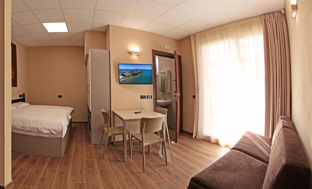 Telewizja i/lub zestaw kina domowego w obiekcie Smeraldo dip Villa Canneto