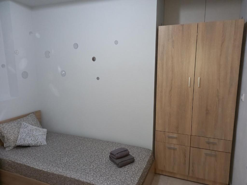 Łóżko lub łóżka w pokoju w obiekcie PUZZLE SWEET HOME