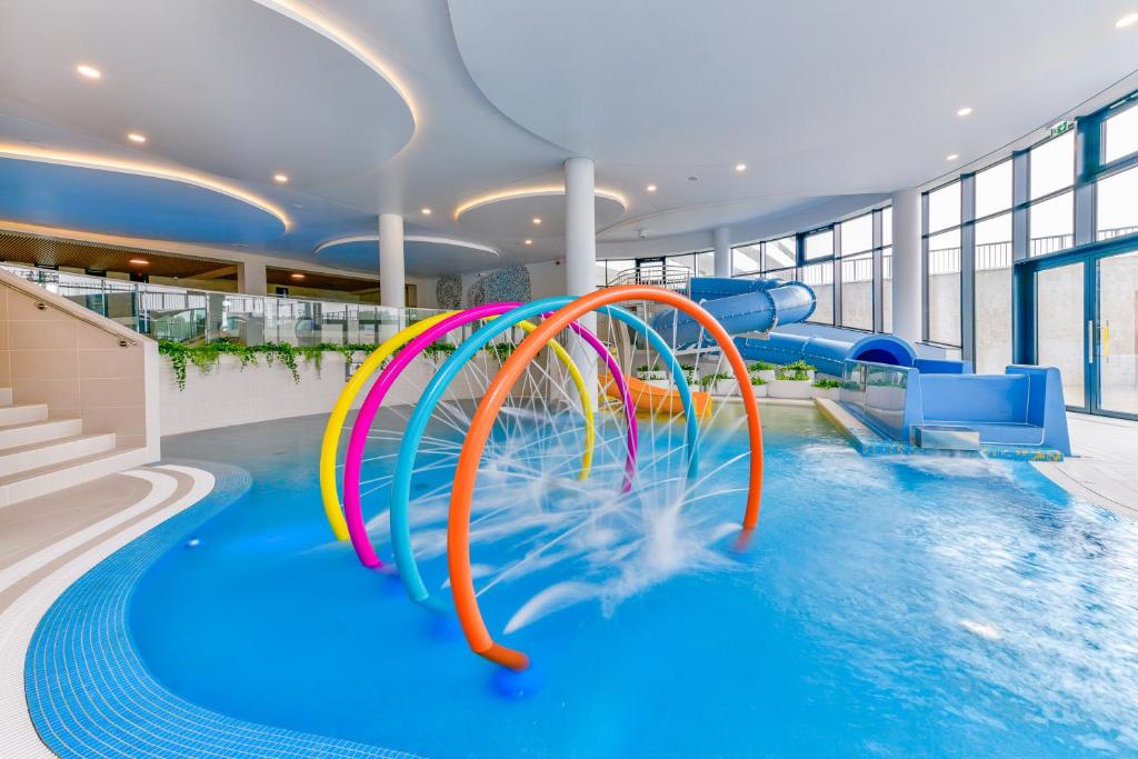 Bazén v ubytovaní POLANKI AQUA Apartamenty PREMIUM - w cenie nielimitowany dostęp do strefy Aqua alebo v jeho blízkosti