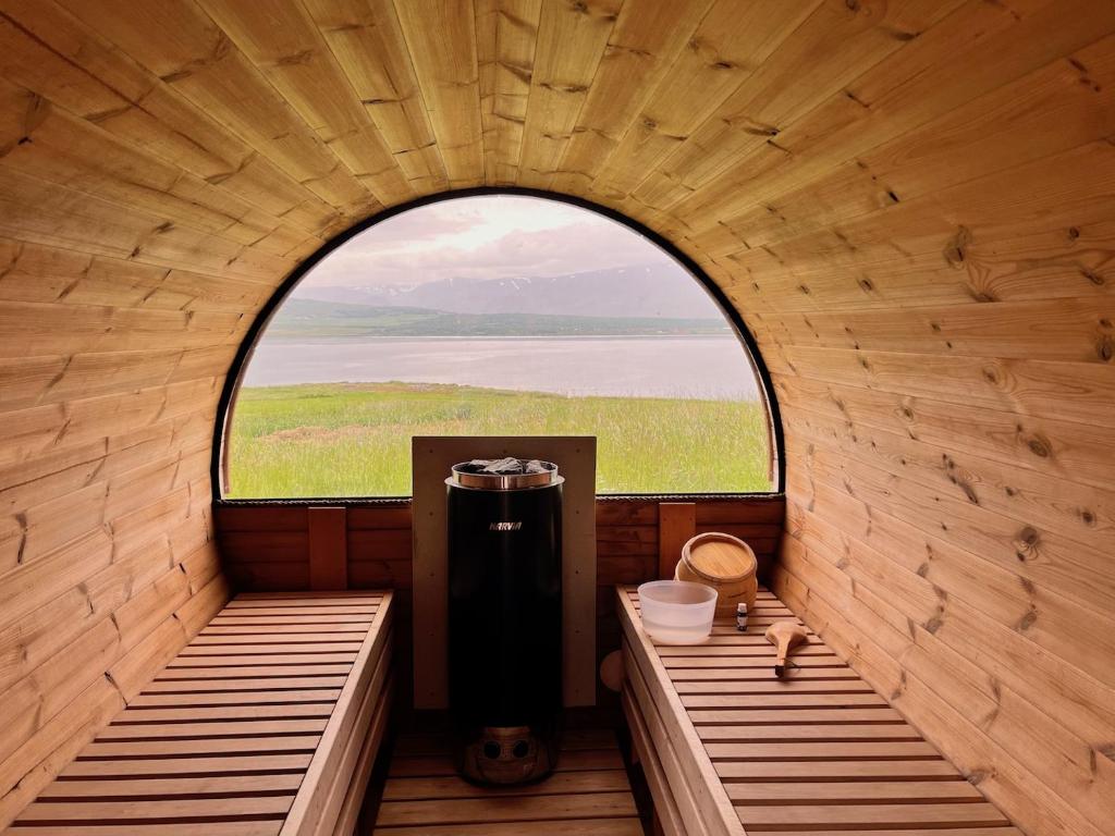 an inside view of a room with a window at Helgafell retreat center in Akureyri