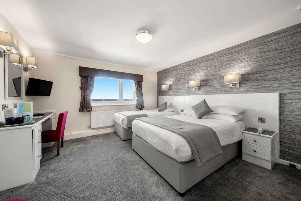 Кровать или кровати в номере Viking Hotel - Adults Only