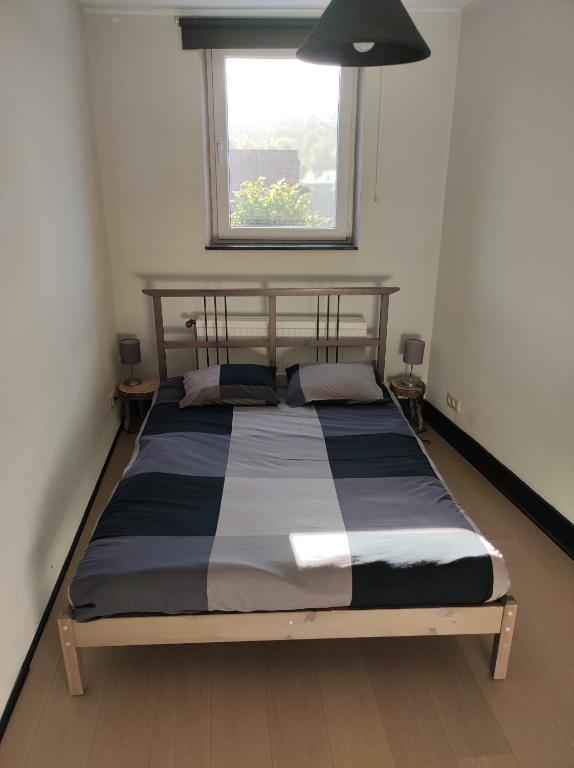 Postel nebo postele na pokoji v ubytování L'Amarante chambres d'hôtes OU gîte citadin