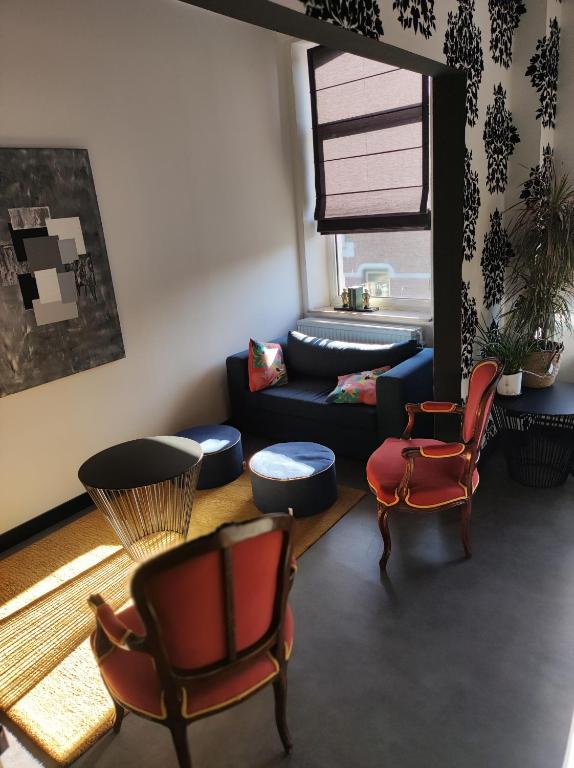 Posezení v ubytování L'Amarante chambres d'hôtes OU gîte citadin