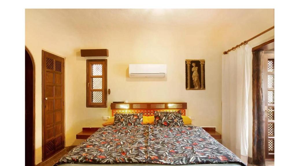 Posteľ alebo postele v izbe v ubytovaní VCV VILLA BAHÍA FELIZ