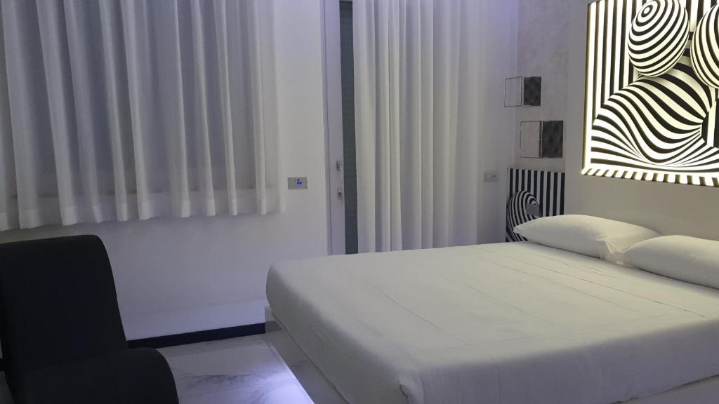 Postel nebo postele na pokoji v ubytování C rooms - Love Motel Monza