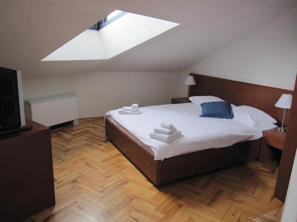 Postel nebo postele na pokoji v ubytování Hotel Park