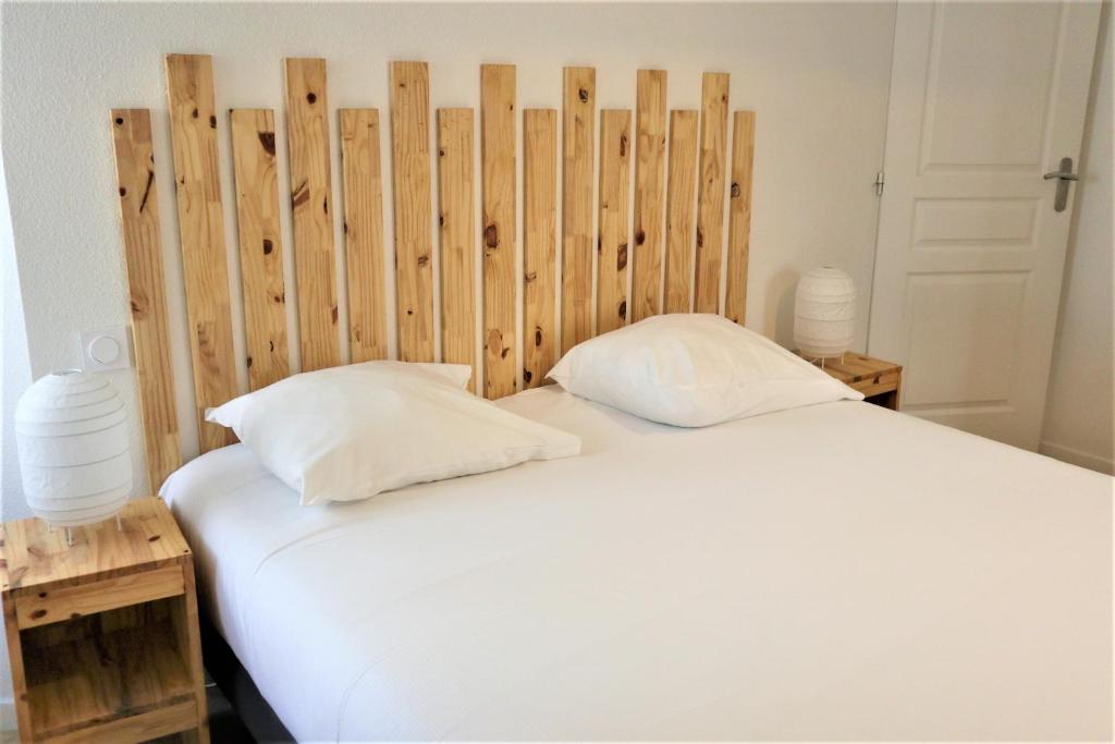 Posteľ alebo postele v izbe v ubytovaní 5 mn Zenith Grande Halle Auvergne,pied de Gergovie,Garage,Netflix