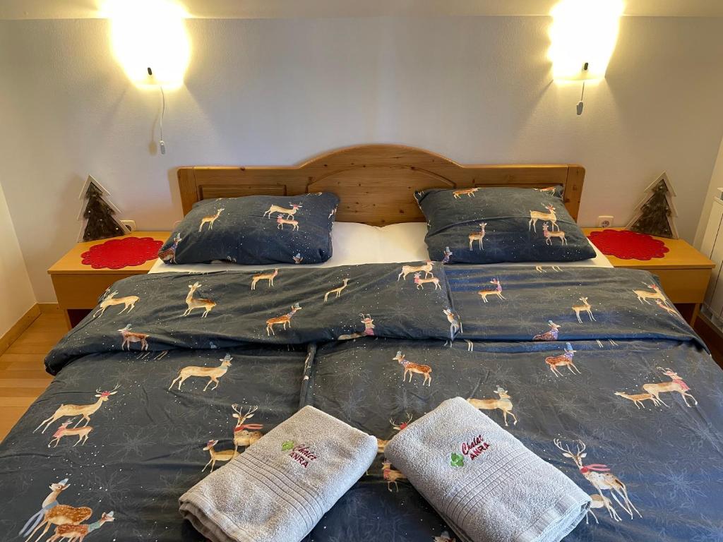 Postel nebo postele na pokoji v ubytování Chalet ANRA Pohorje