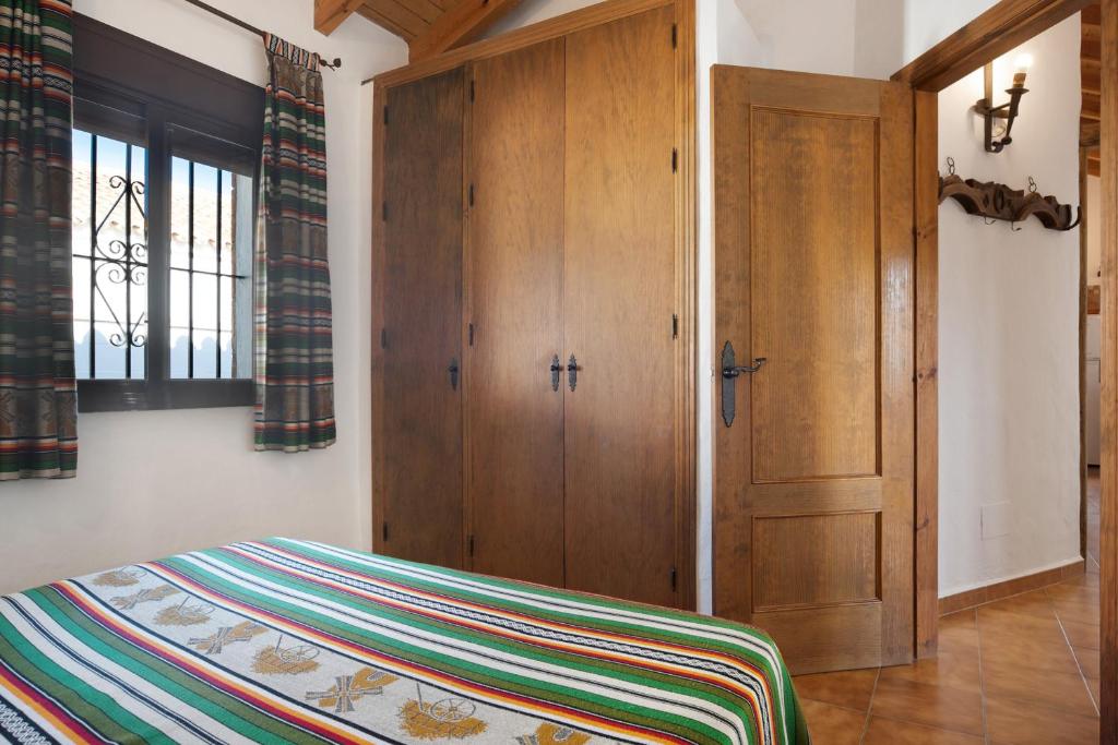 Posteľ alebo postele v izbe v ubytovaní Casa Alberto