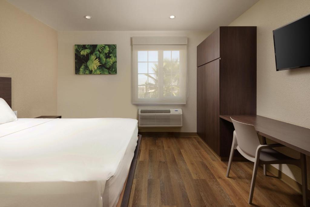 Postel nebo postele na pokoji v ubytování Extended Suites Coatzacoalcos Forum