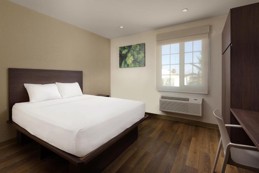 Postel nebo postele na pokoji v ubytování Extended Suites Coatzacoalcos Forum