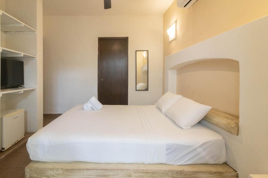 Postel nebo postele na pokoji v ubytování Hotel Boutique Pachamama