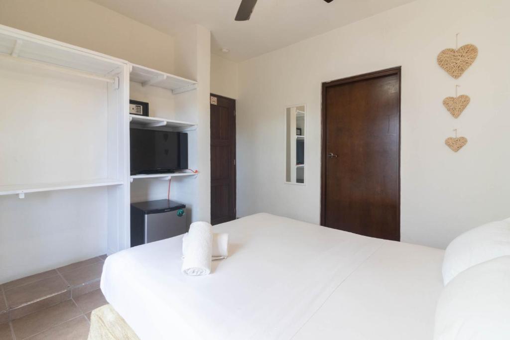 Postel nebo postele na pokoji v ubytování Hotel Boutique Pachamama
