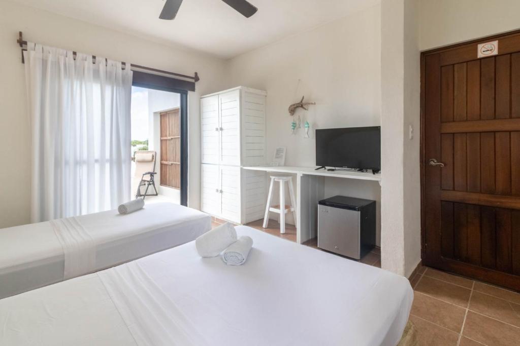 Postel nebo postele na pokoji v ubytování Hotel Boutique Pachamama