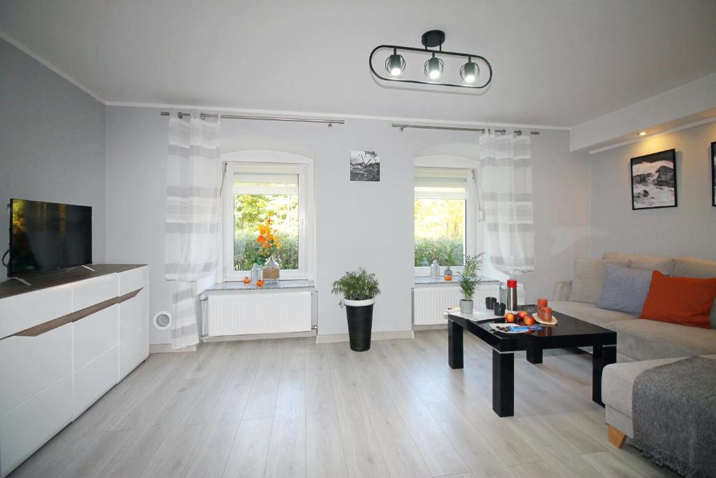 Posezení v ubytování Apartament Dzikowiec