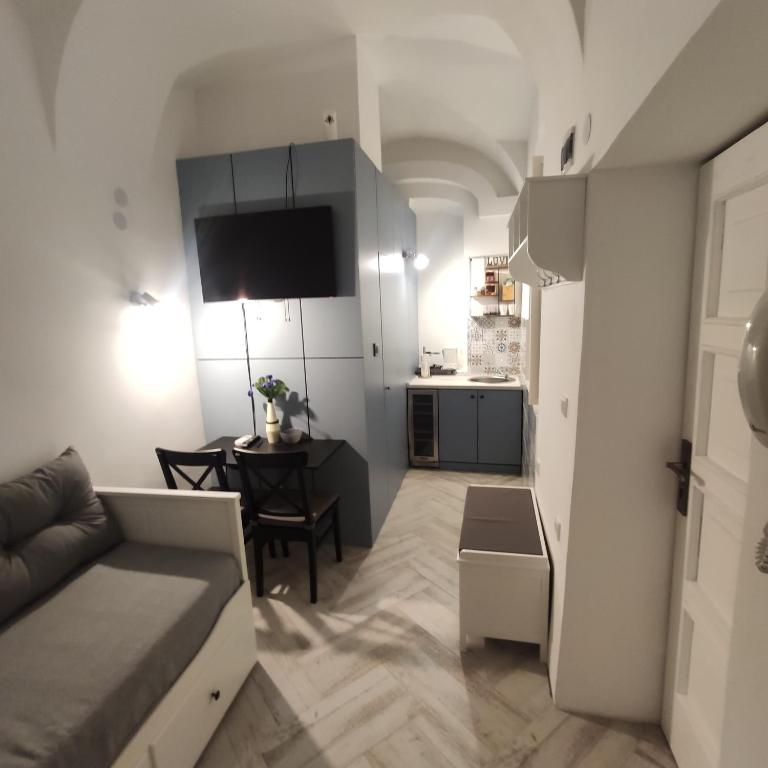 Kuchyň nebo kuchyňský kout v ubytování Room Angel