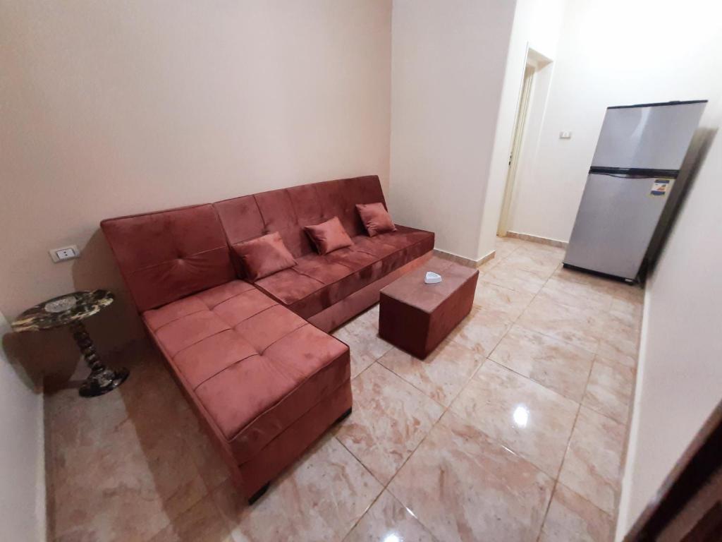 A seating area at Aton pyramids view guest house