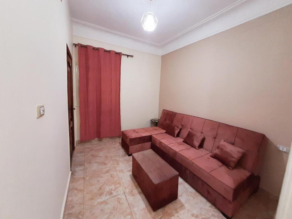 A seating area at Aton pyramids view guest house