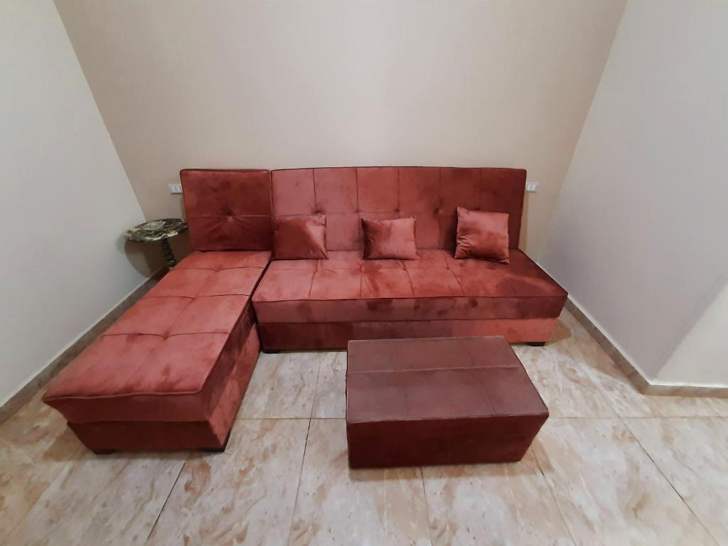 A seating area at Aton pyramids view guest house