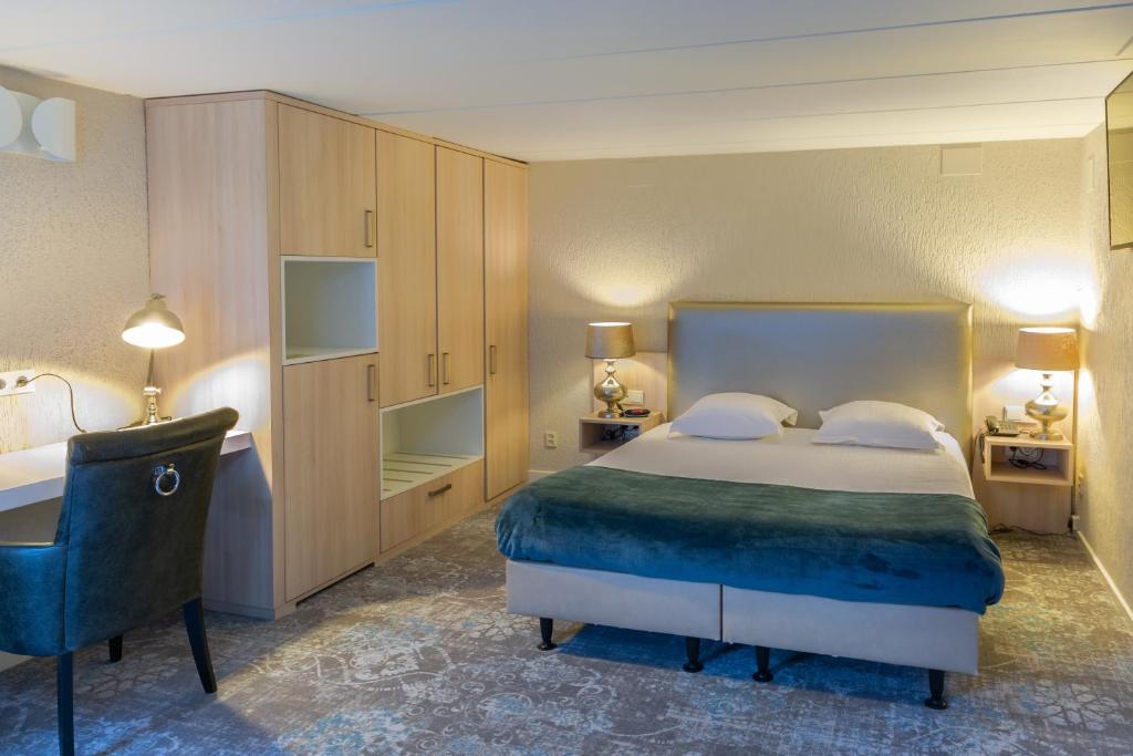 Postel nebo postele na pokoji v ubytování Hotel Edenpark