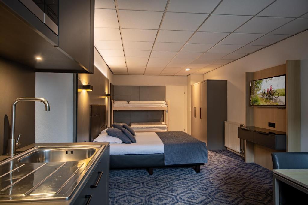 Postel nebo postele na pokoji v ubytování Hotel Edenpark