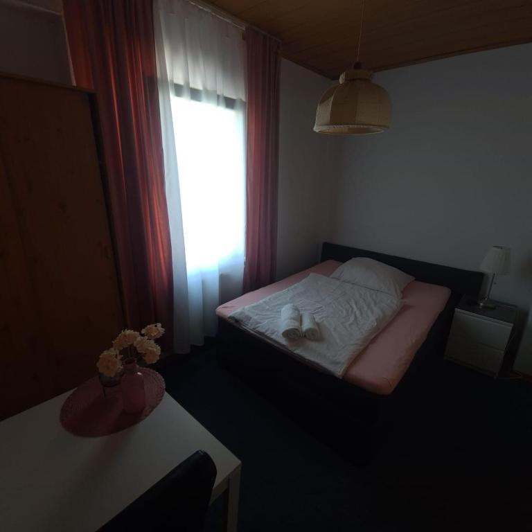 Postel nebo postele na pokoji v ubytování Hotel Dalmacija