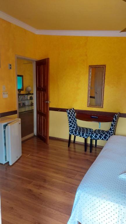 Uma cama ou camas num quarto em The Lighthouse at Casa Max