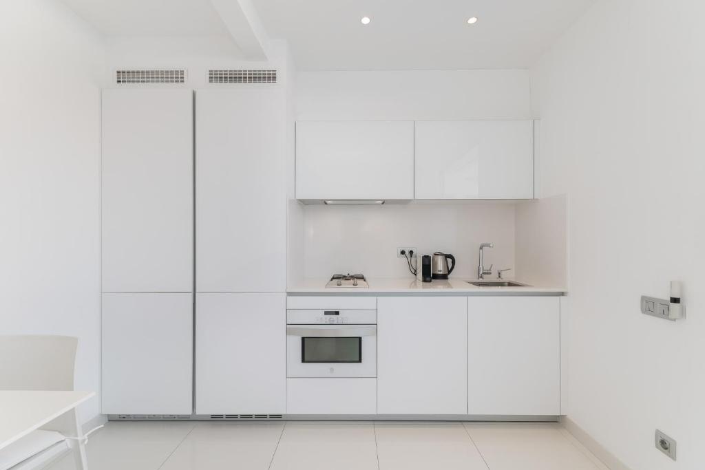 Kuchyň nebo kuchyňský kout v ubytování Beach penthouse Sitges Rentals
