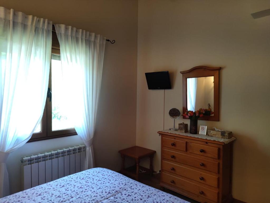 Posteľ alebo postele v izbe v ubytovaní Casa Rural Refugio del Cueto***
