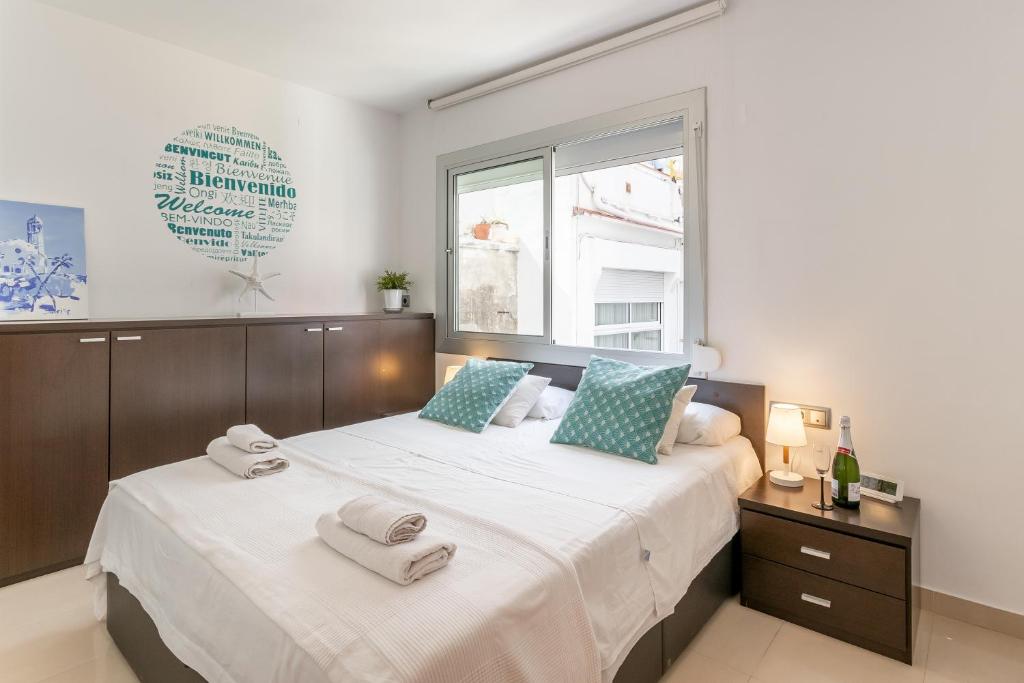 Postel nebo postele na pokoji v ubytování Fragata Sitges Rentals