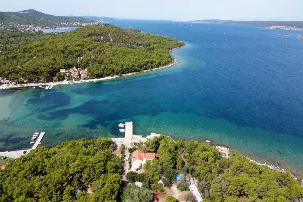 an aerial view of a small island in the water at Rooms by the sea Pasman - 4309 in Pašman